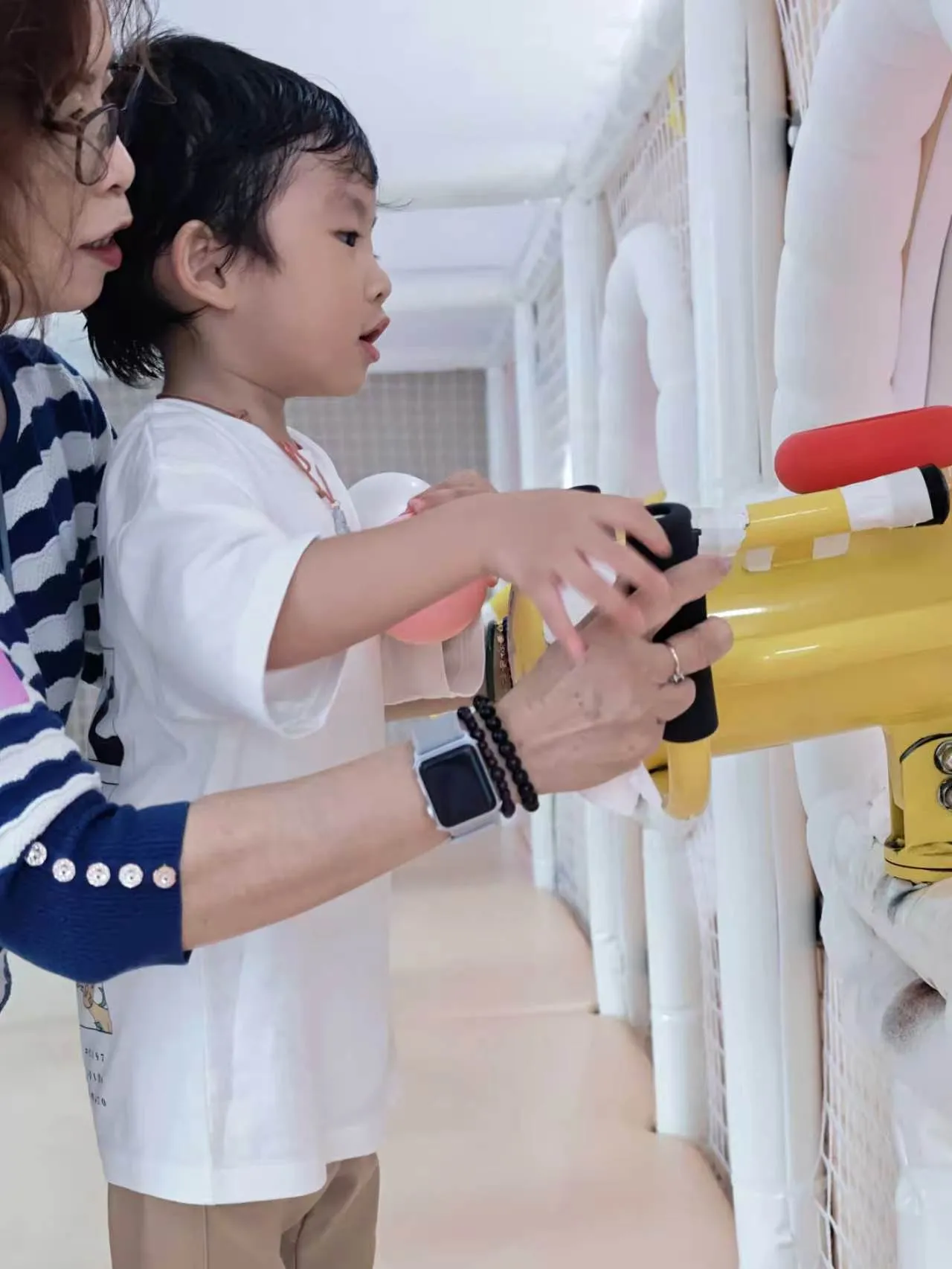 Child with the ball blaster, Kidstation North Point