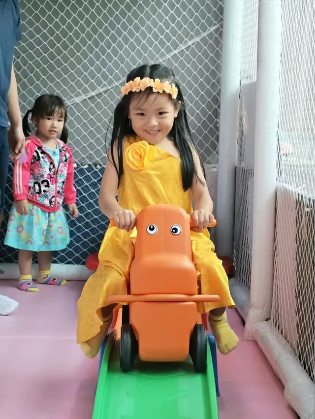 Child on the slide at Kidstation Tsuen Wan